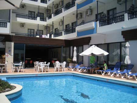 The Agrabella hotel pool and courtyard